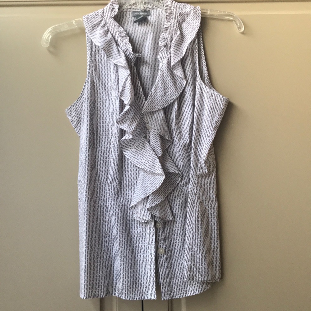 Ruffled sleeveless blouse